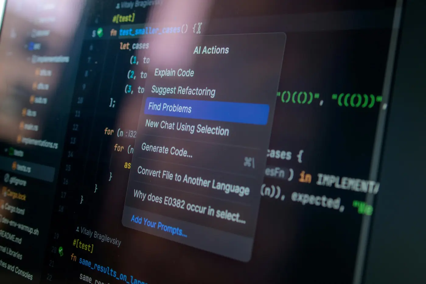 Developer working across dual monitors in a clean workspace